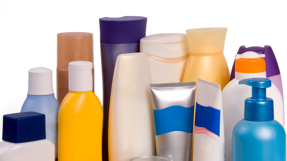 various plastic shampoo and lotion bottles